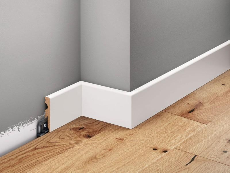 Prosty przewodnik: Jak skutecznie zamontować listwy przypodłogowe na klej?